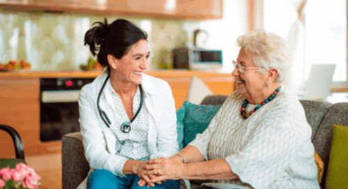 doctor with patient on couch